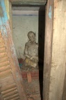 A creepy old statue I found near a Wat