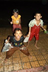 Kids playing in the rain in Kompong Cham
