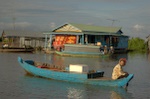 Taking the boat from Siem Reap to Batambang we pass through a floating village