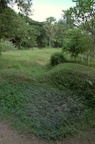 The indentations are pits where bodies were buried