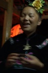 She sang to us three times and we had to drink rice wine after each song. It's a famous Miao tradition.