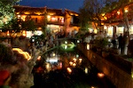 Candles floating down river
