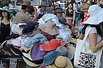 Korean ladies love their hats. But after 45 it's mandatory to switch to a visor. The bigger the better.