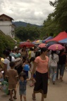 People gathering for a good spot on the banks of the river