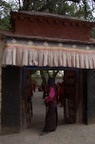 A local woman looks on