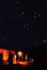 Hundreds of the balloons/lanterns fly in the sky