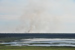 Back burning in the distance